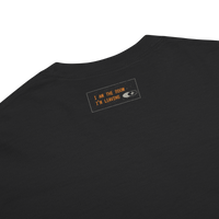 Internal Migration — detail shot, garment dyed heavyweight tee, edition of 50, no reprint